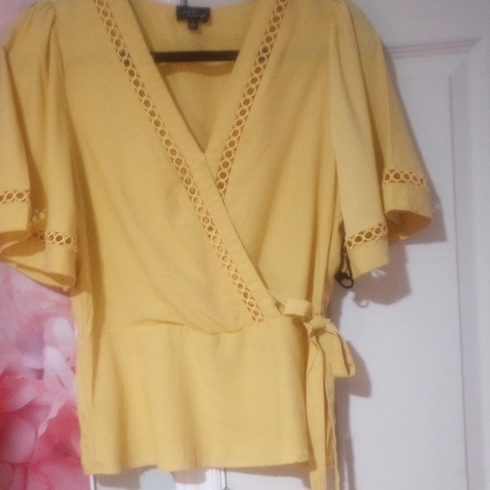 Elegant Yellow Wrap Blouse with Lace Detail